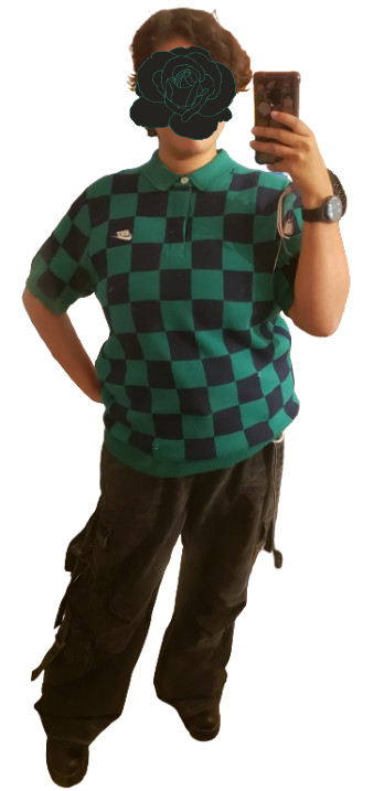 this shirt is kind of like a sweater i love it so much a checkered green and dark blue shirt with baggy black pants