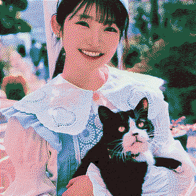 yukika smiling with a cat