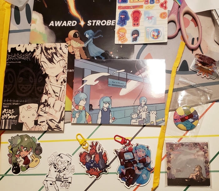 an assortment of things that came with the siinamota fanzine